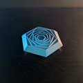 3D printed hexagon fidget toy with cinematic dramatic lighting