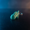 3D printed fish fidget keychain with cinematic dramatic lighting