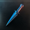 3D printed skull knife with cinematic dramatic lighting
